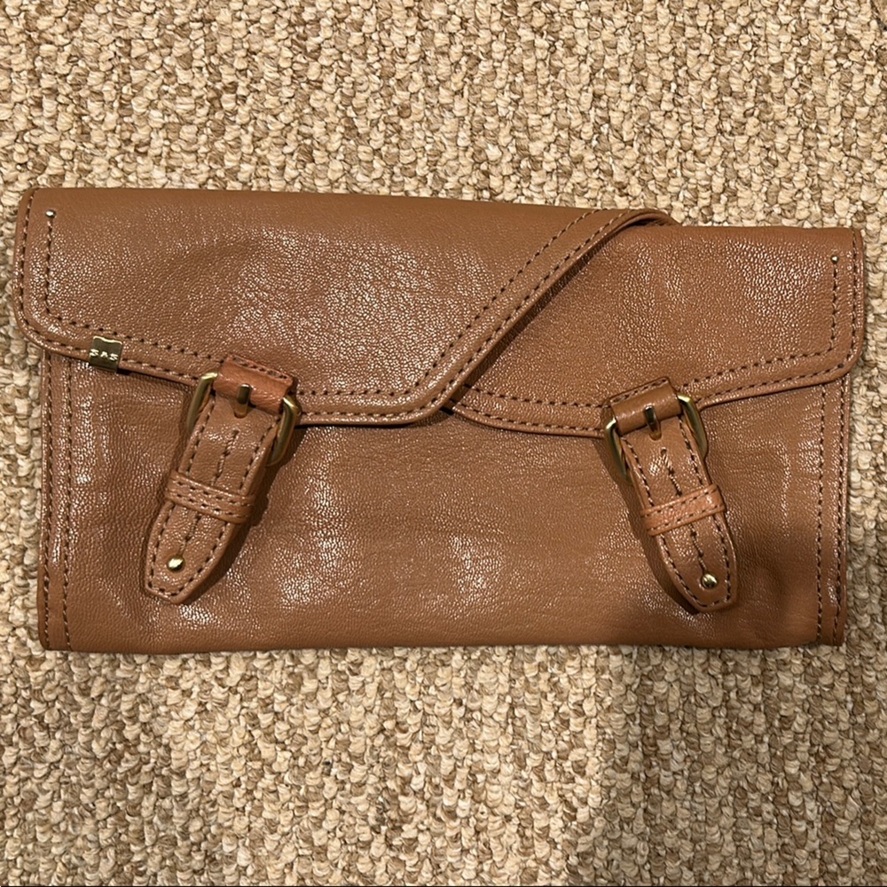 Brown Leather Wallet with Distressed Texture and Buckle Details